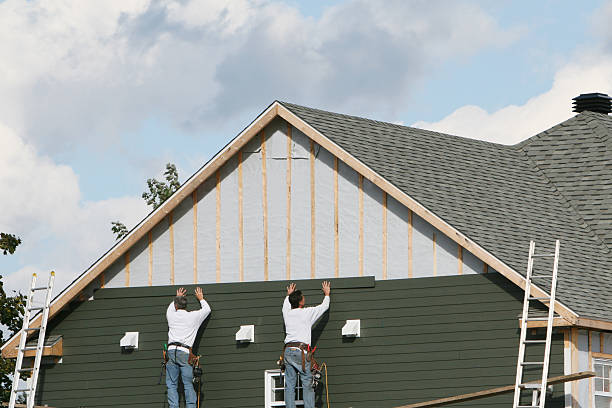 Professional Storm Damage Siding Repair technician working in Strongsville, OH